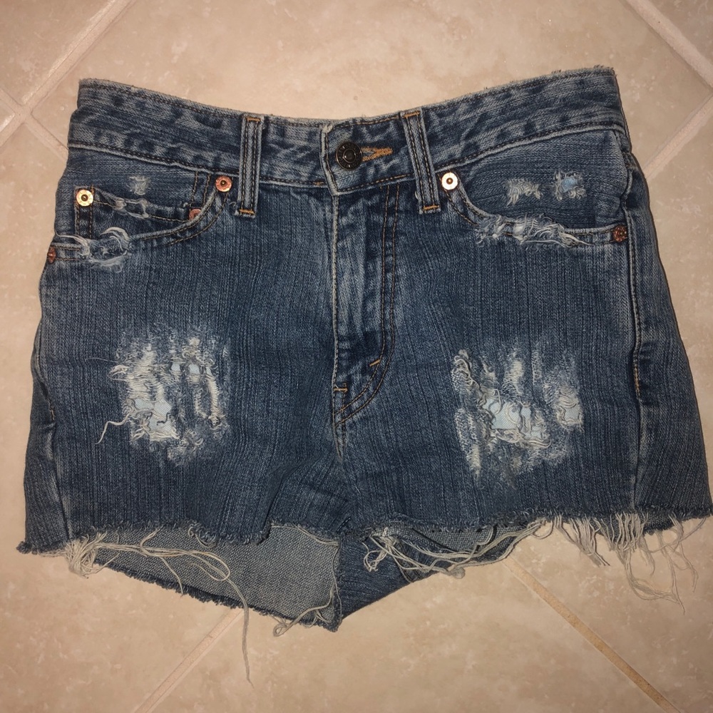 Levi’s Frayed Mini Jean Shorts